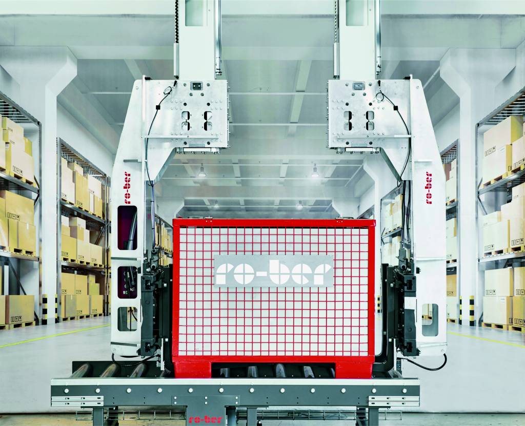 Das Robotersystem Twin-Gantry mit einer Traglast von 1.500kg wurde für die Handhabung von Großladungsträgern zur Routenzugbeladung entwickelt.