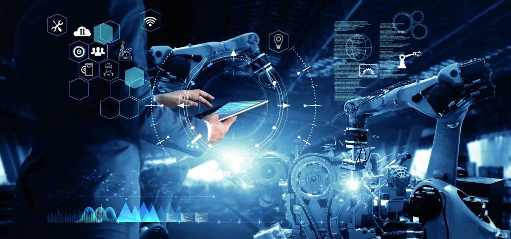 Manager Technical Industrial Engineer working and control robotics with monitoring system software and icon industry network connection on tablet. AI, Artificial Intelligence, Automation robot arm