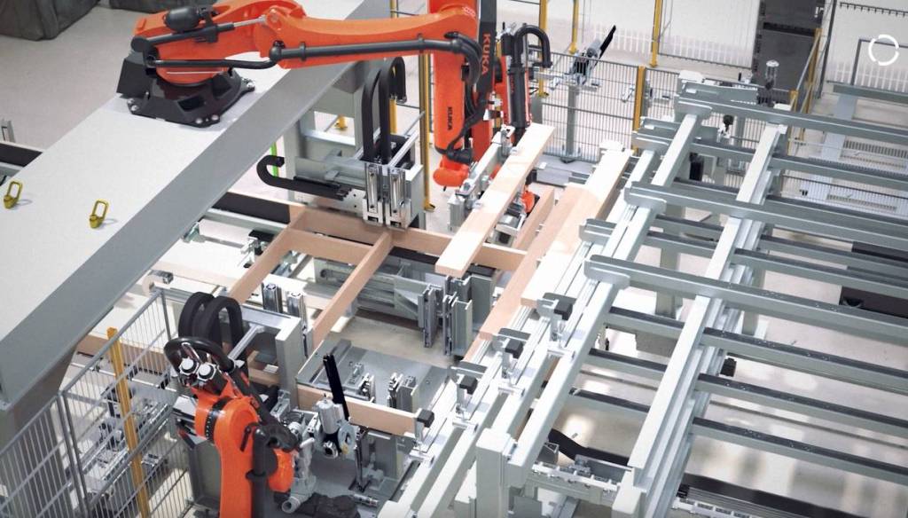 Beim automatisierten modularen Hausbau mit Kuka werden Häuser nicht mehr auf der Baustelle gefertigt, sondern mit roboterbasierter Automatisierung in der Fabrik gefertigt.